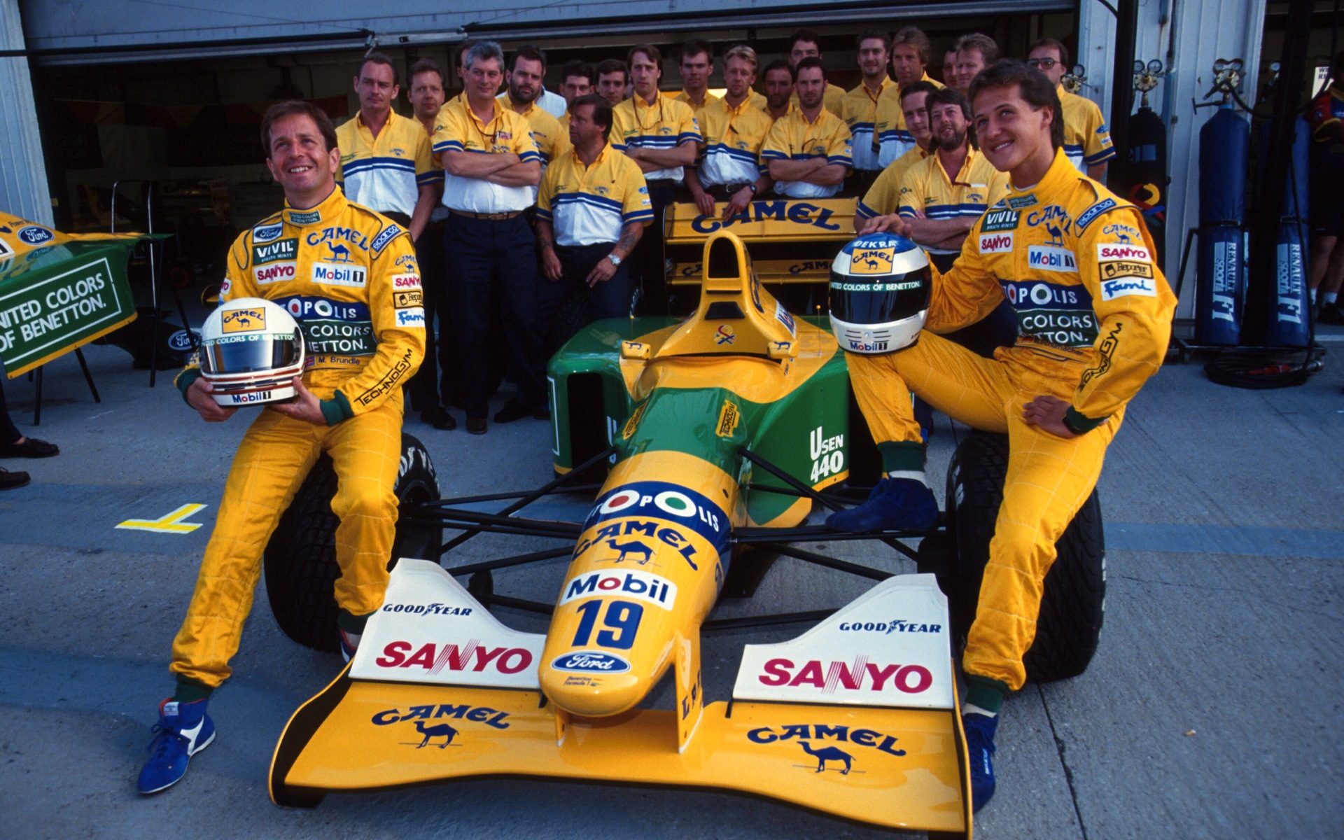 Michael Schumacher and his teammate Martin Brundle pose with B192-05 at the Hungarian Grand Prix