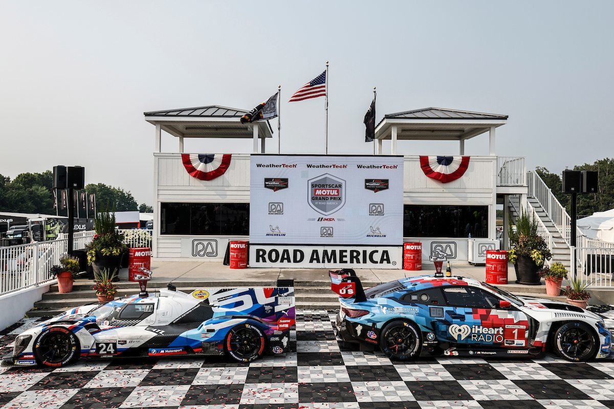 GTP winner #24: BMW M Team RLL, BMW M Hybrid V8, GTP: Philipp Eng, Dries Vanthoor with GTD Pro winner #1: Paul Miller Racing, BMW M4 GT3 EVO, GTD PRO: Madison Snow, Neil Verhagen
